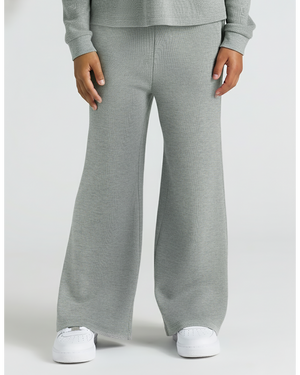 Child wearing Girls Heather Gray Waffle Long Sleeve Henley & Waffle Leg Pants.