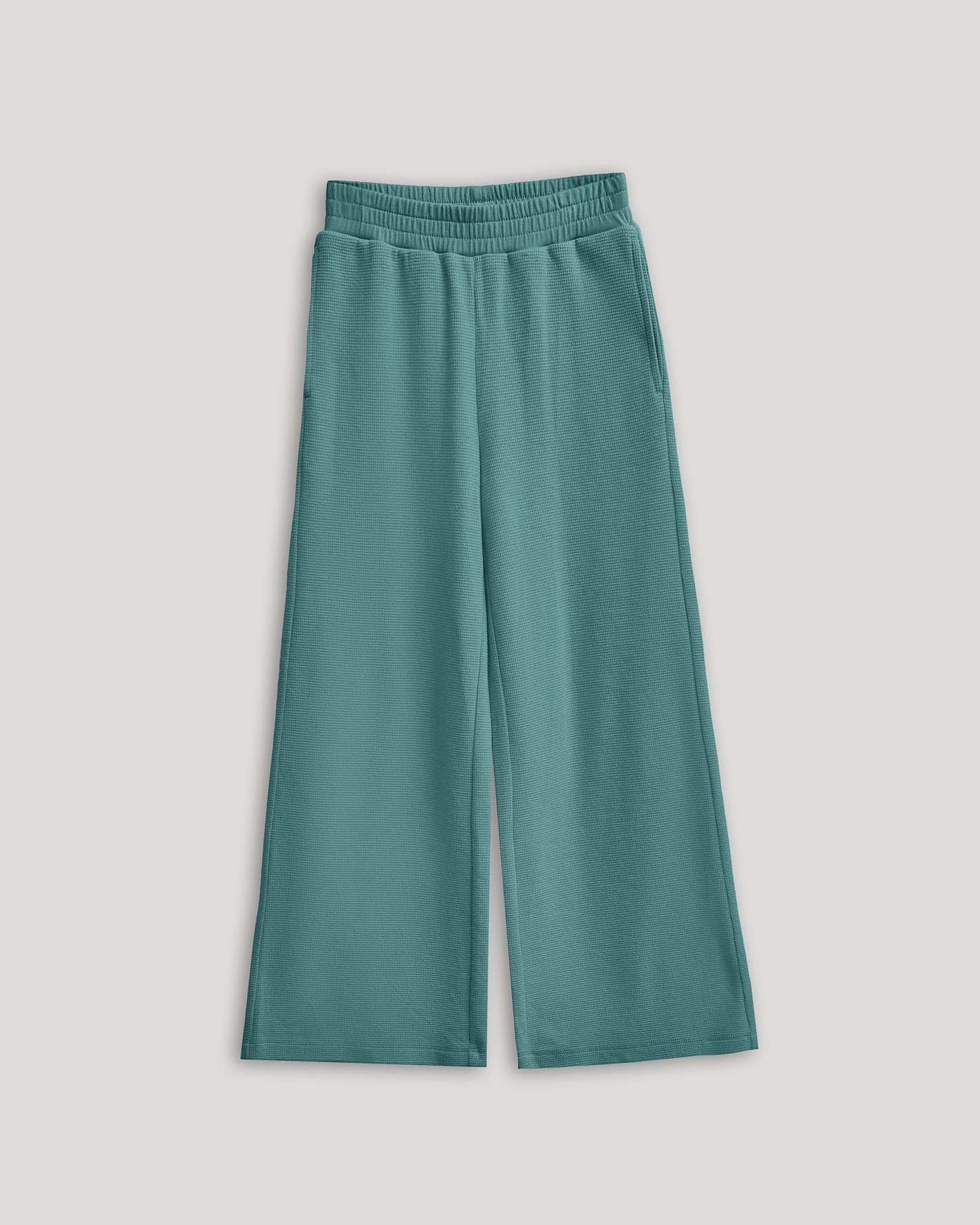 Girls Stormcloud Waffle Wide Leg Pants with elastic waist and side pockets.