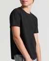 Teen in Boys' Classic Curved Hem Crew Neck, black tee, relaxed fit.