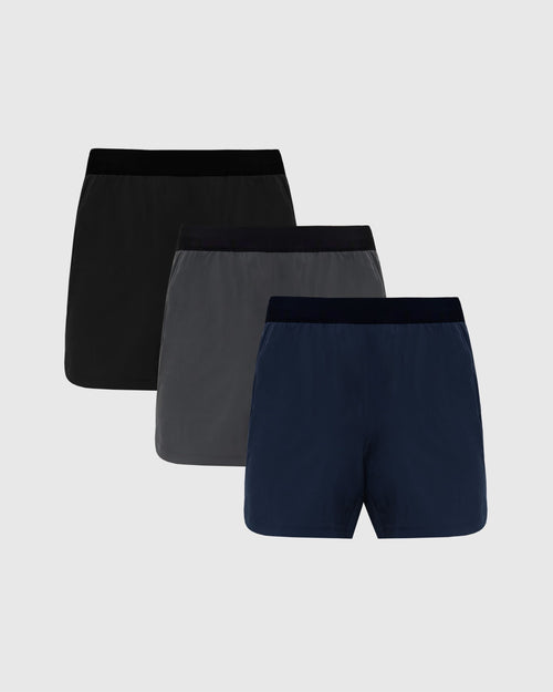 7 Basic Active Training Short Pack stacked in black, gray, navy.