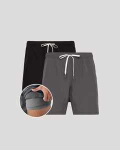 True ClassicTwo pairs of shorts, one black and one gray, with drawstrings on a light gray background.