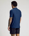 Rear view of man in navy Active Polo 10-Pack shirt.