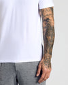 Active Polo 6-Pack showcased with tattooed arm and plain white T-shirt.