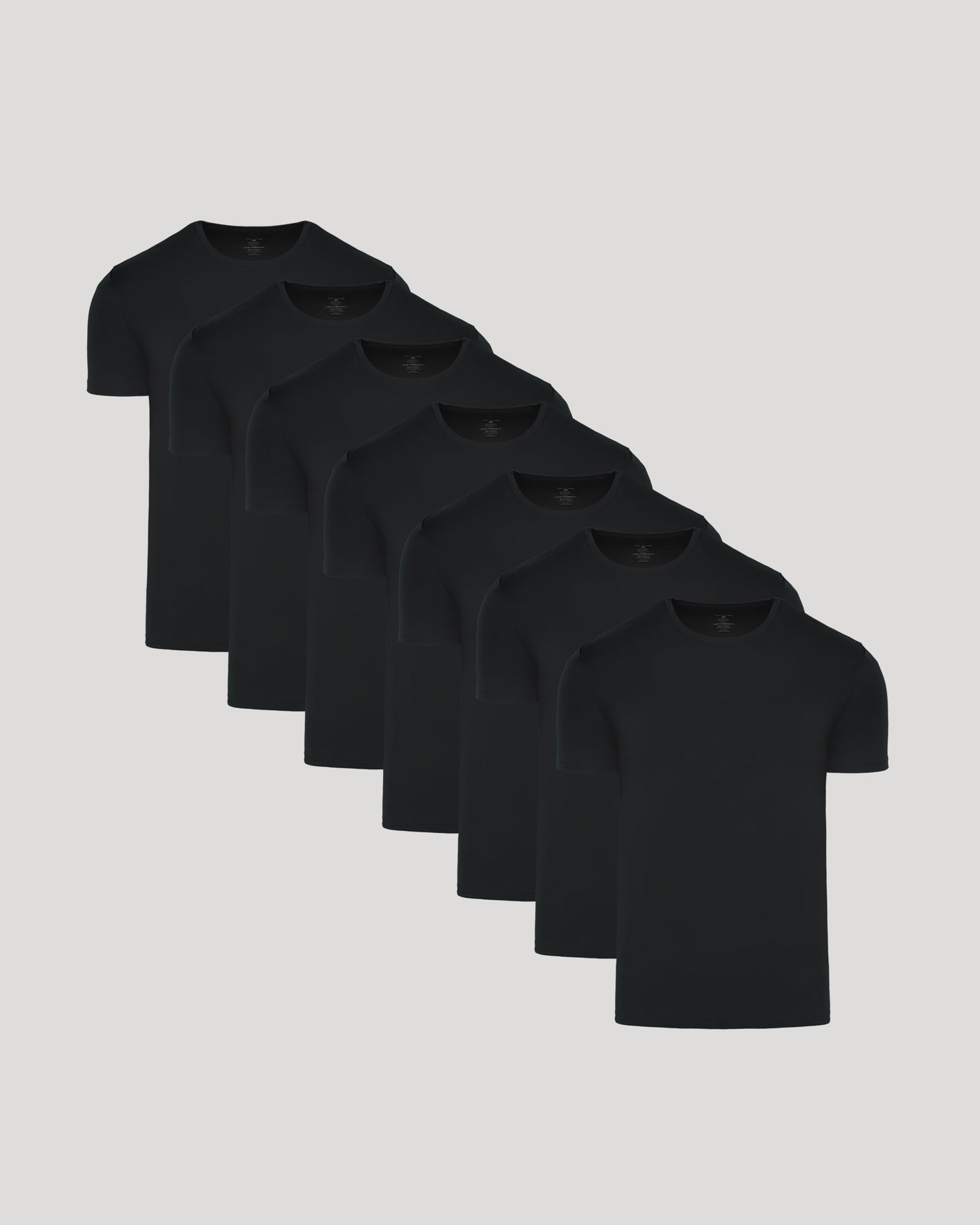 Black Premium Pima Crew Neck 7-Pack, staggered, showcasing sleek, refined design.