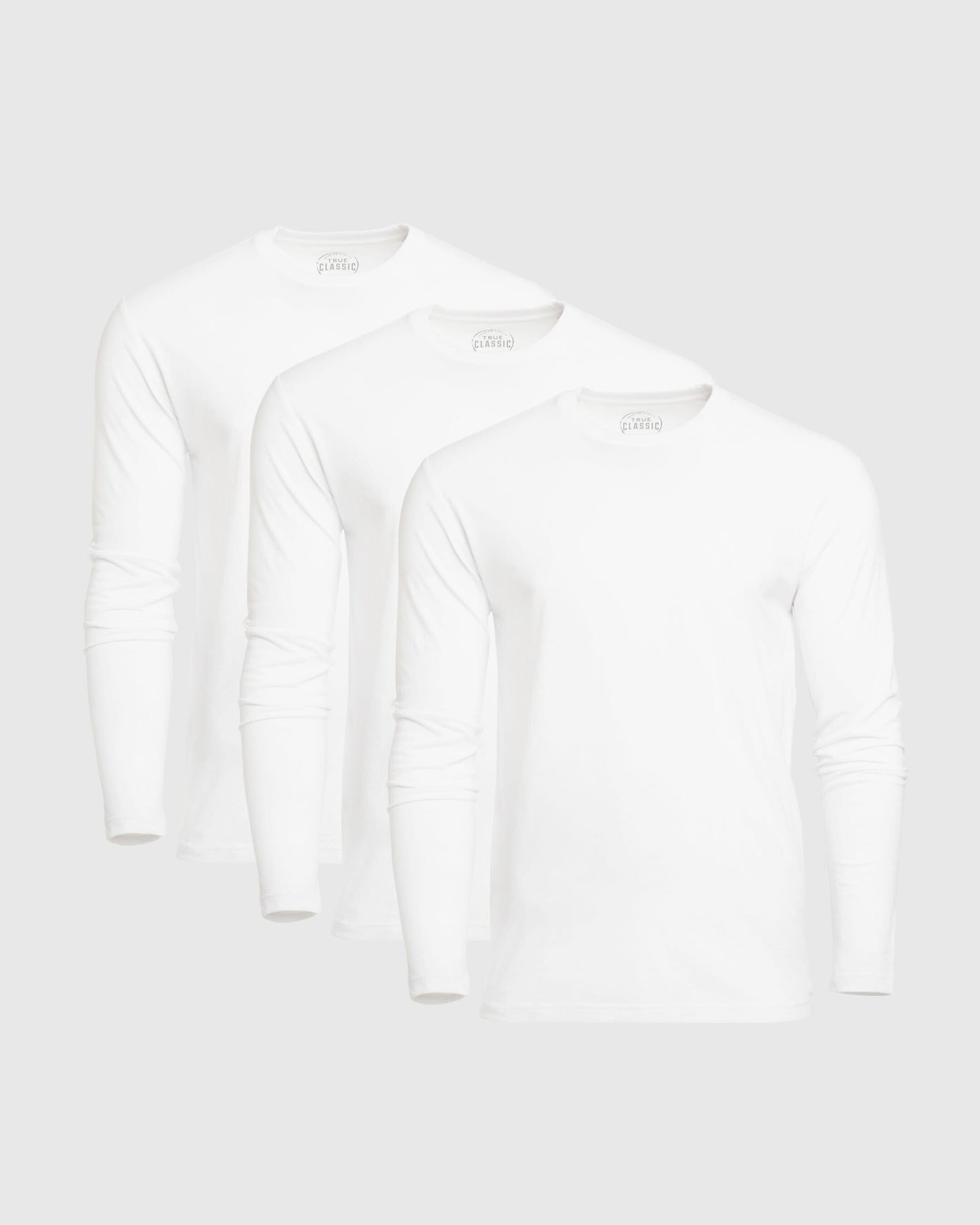 True Classic Men’s Long Sleeve Crew Neck Tee, soft cotton stretch, tailored fit.