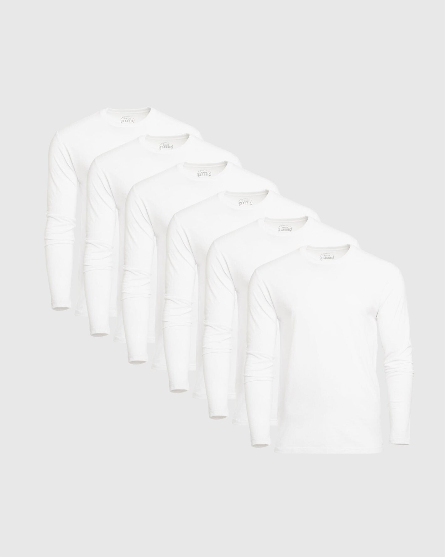 White Classic Long Sleeve Crew Neck 6-Pack, plain white shirts displayed fanned.