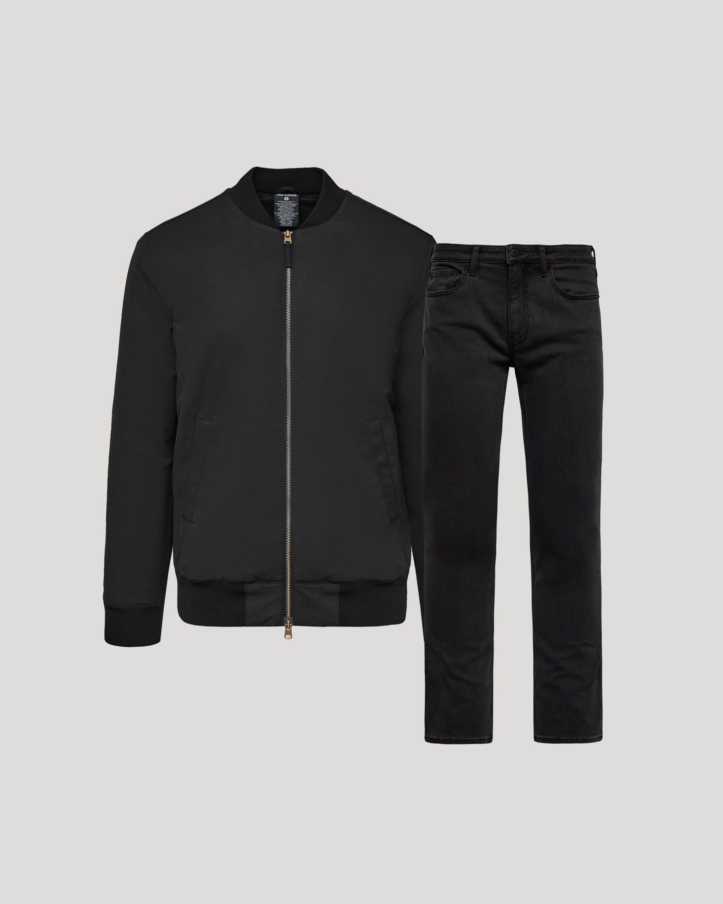 Black Bomber Jacket & Comfort Stretch Jeans 2-Pack on gray background.