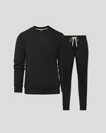 Conjunto de dos sudaderas y pantalones deportivos de polar negro