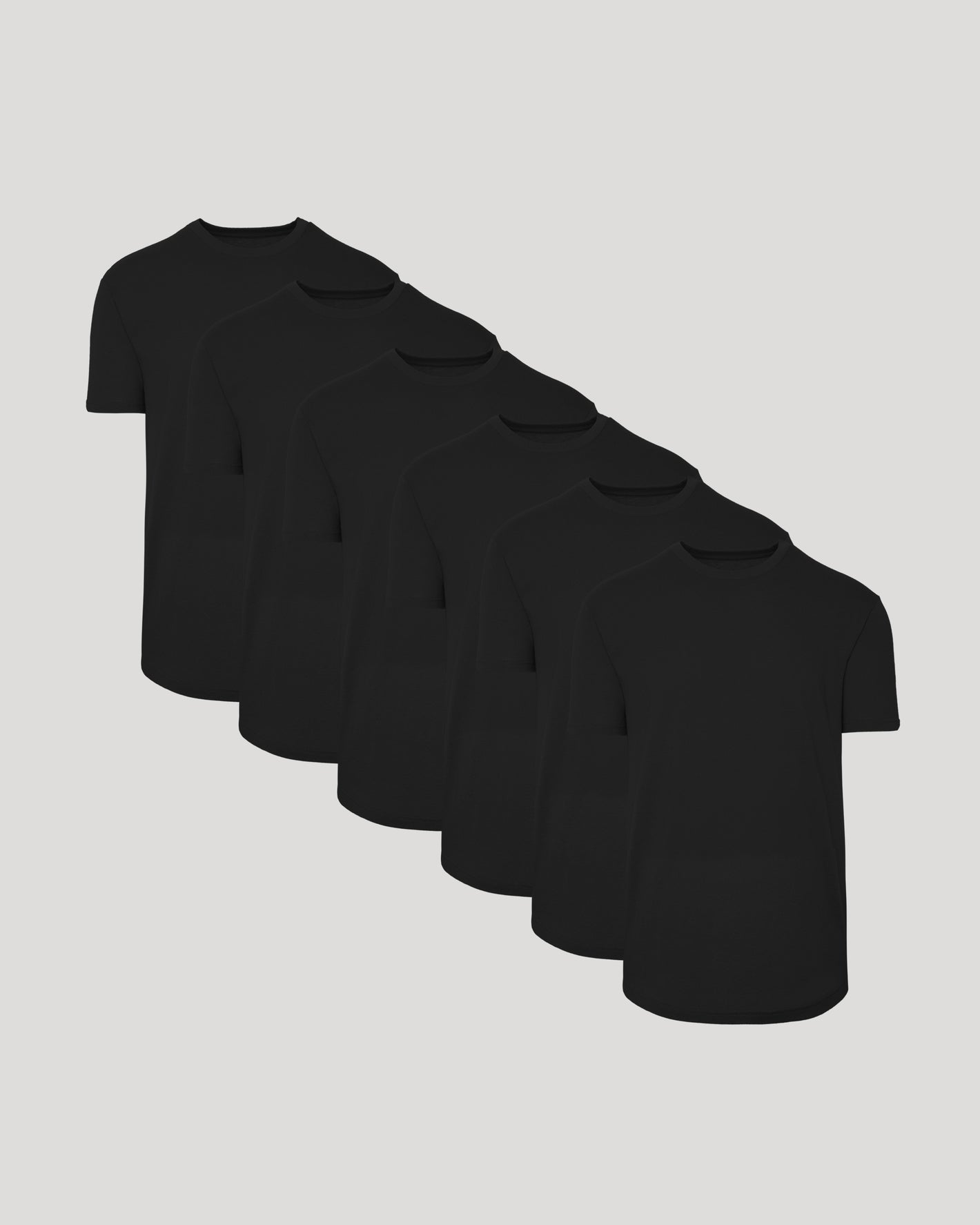 Black Curved Hem Classic Crew Neck 6-Pack, arranged overlapping on gray background.