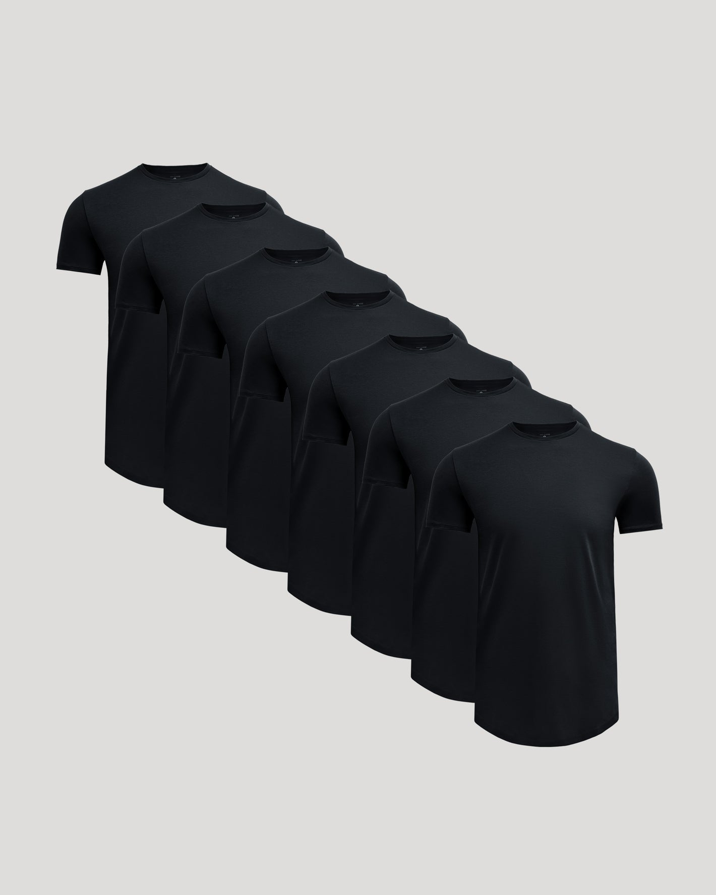 Black Tall Premium Pima Crew Curved Hem 7-Pack arranged diagonally.