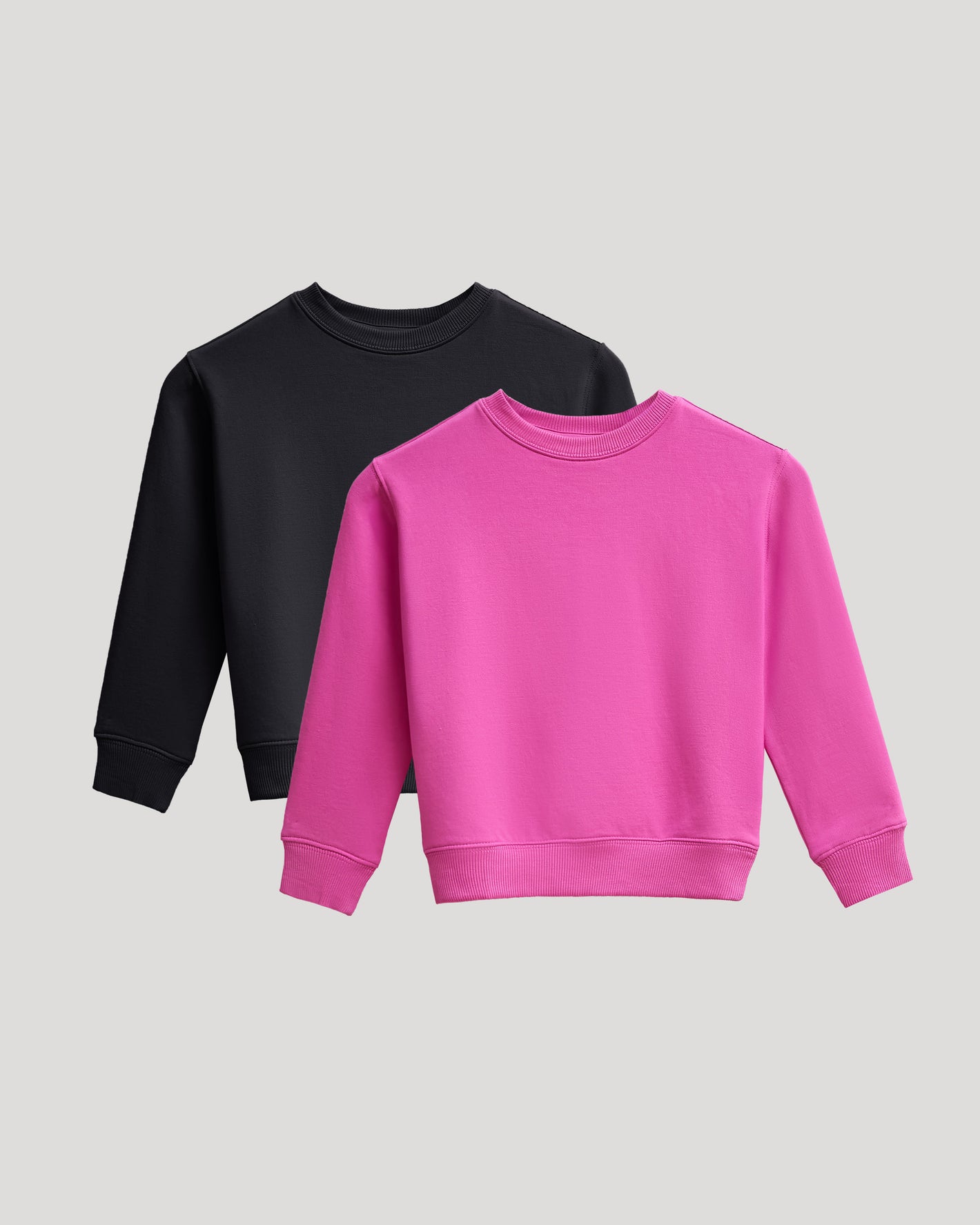 Girls Black & Electric Fuchsia Slouch Pullover Crew 2-Pack displayed on gray background.