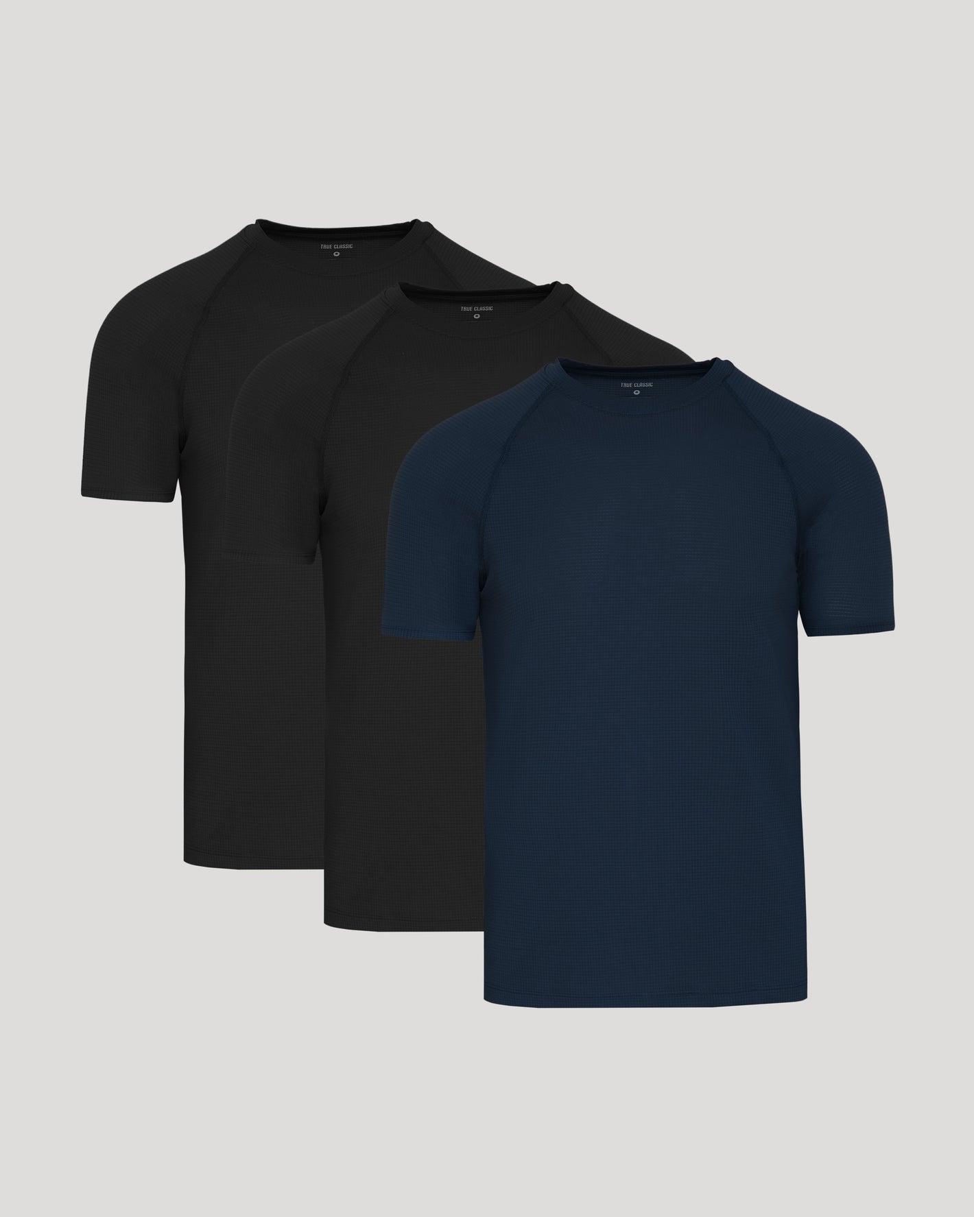 Black & Navy Active Mesh Crew 3-Pack overlapping waffle-knit T-shirts.