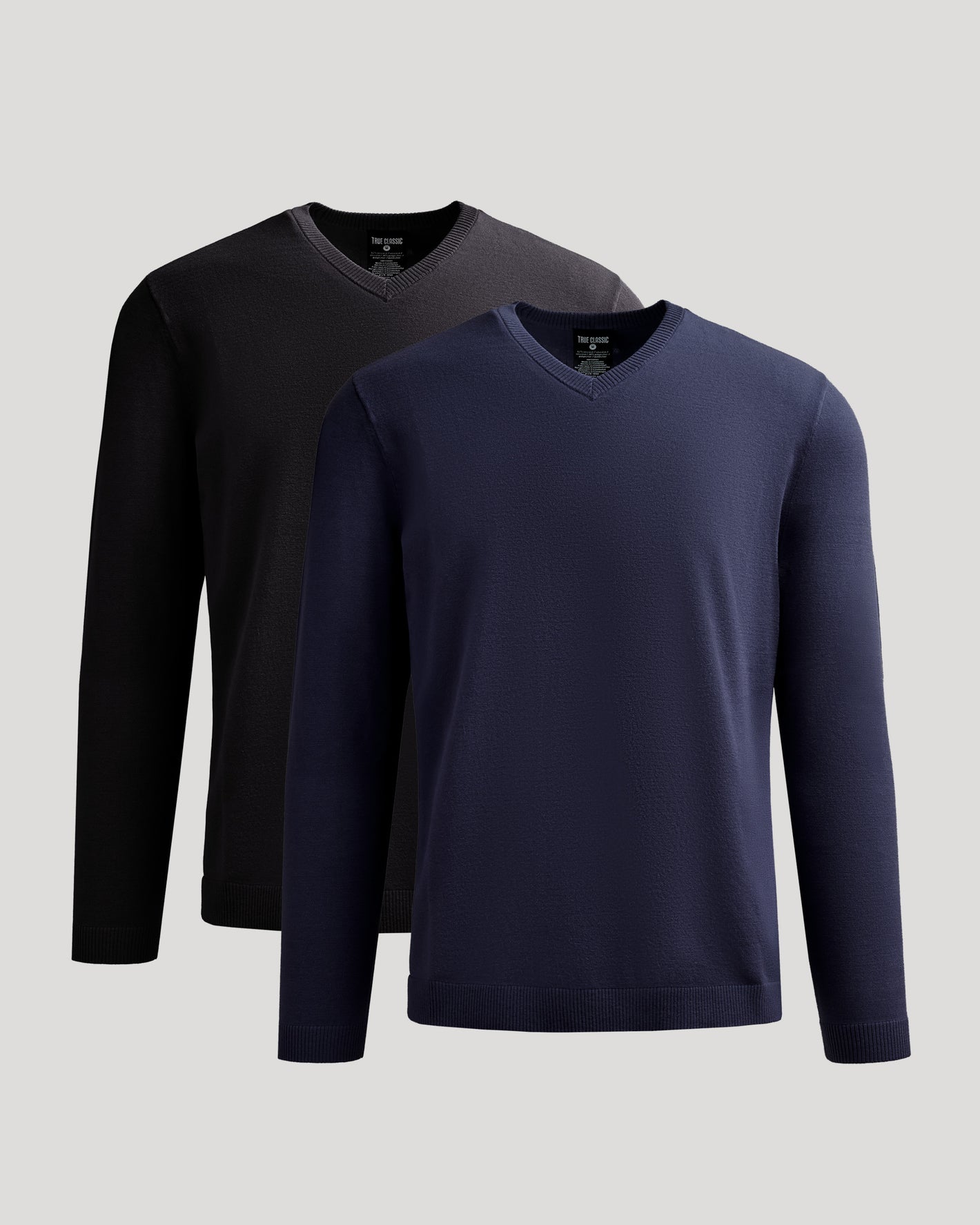 Black & Navy Dressy V-Neck Sweater 2-Pack layered, showcasing elegant knit design.