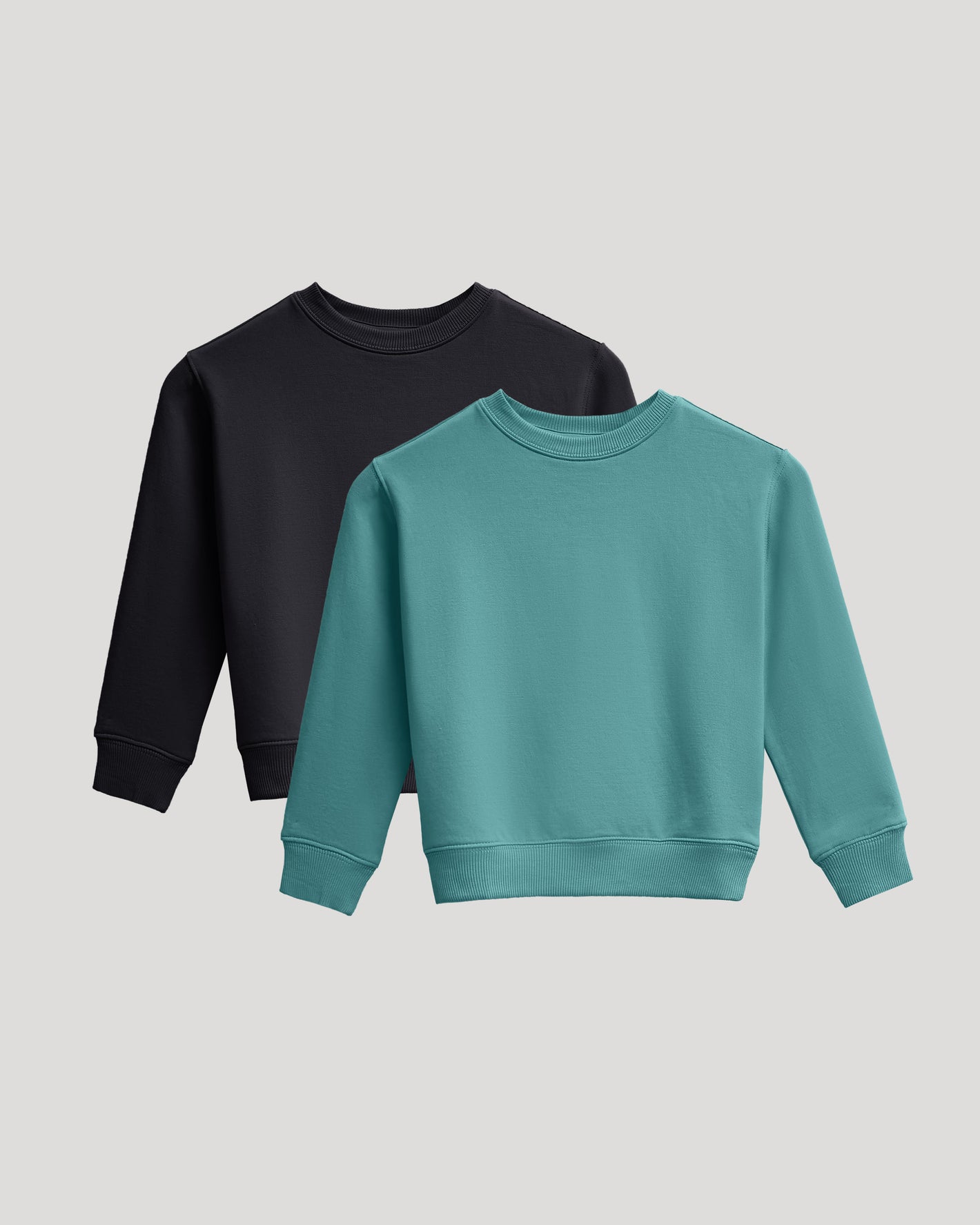 Girls Black & Stormcloud Slouch Pullover Crew 2-Pack on gray background.
