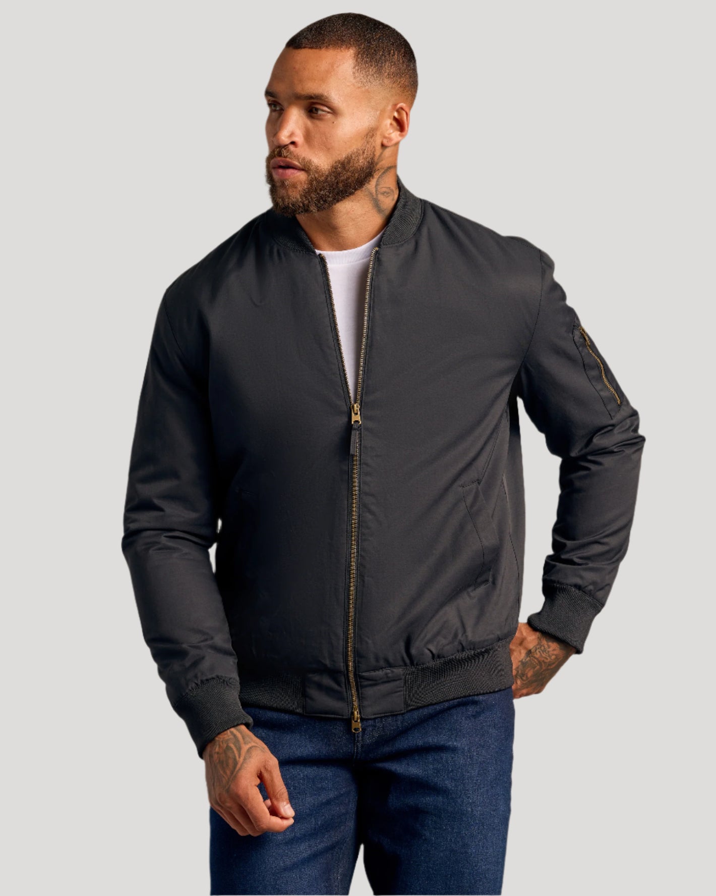 Black Bomber Jacket & Comfort Stretch Jeans 2-Pack worn by male model.