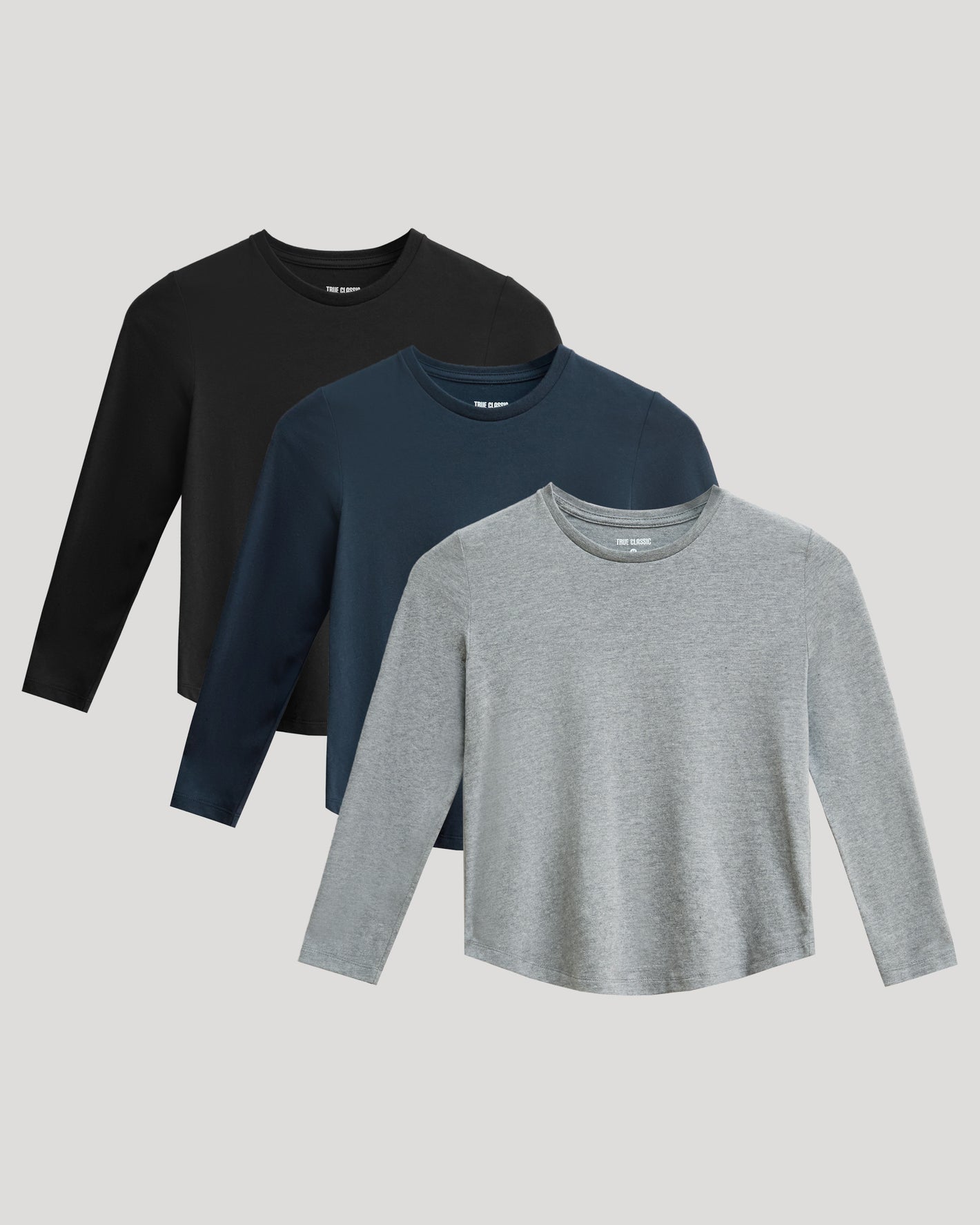 Boys' Classic Long Sleeve Curved Hem Crew Neck 3-Pack layered display.