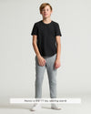Boy wearing Boys' Classic Curved Hem Crew Neck 6-Pack, size M.