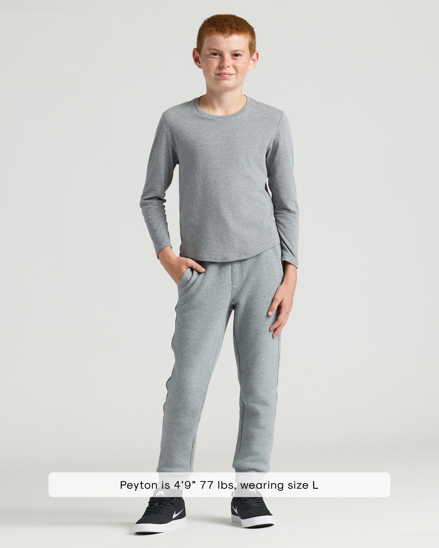 Young model in Boys' Classic Long Sleeve Curved Hem Crew Neck.