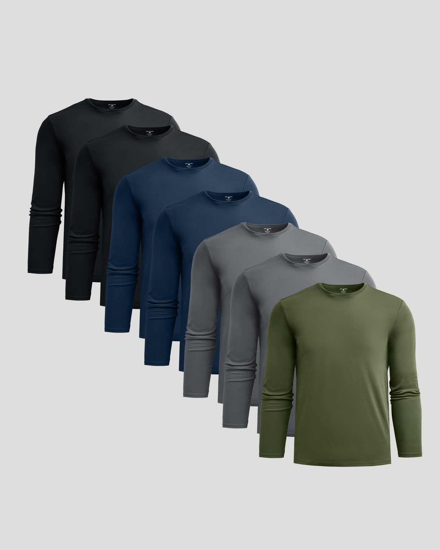 Premium Pima Long Sleeve Crew 7-Pack shirts displayed in staggered layout.