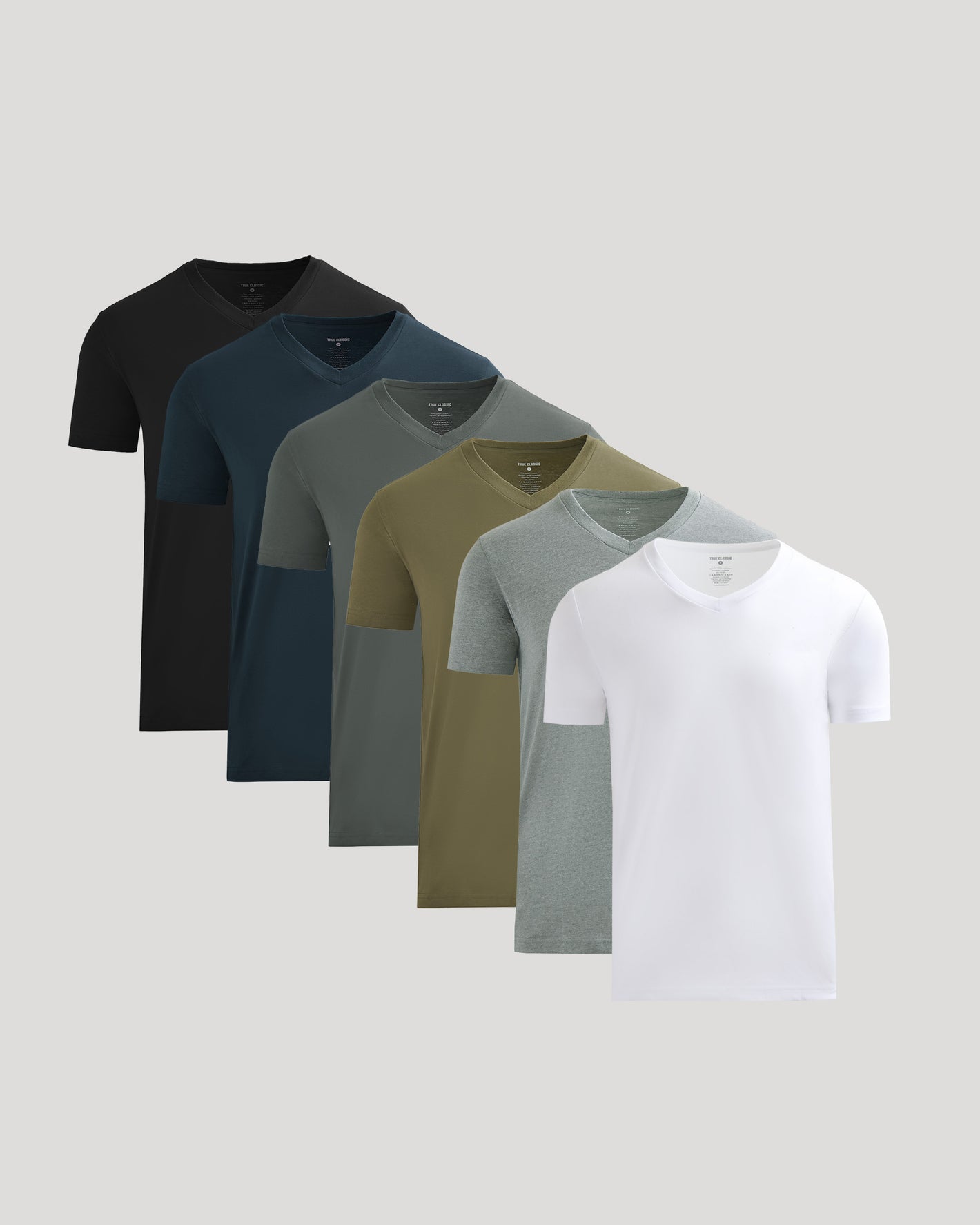 Five V-neck t-shirts in black, navy, gray, green, and white on a light gray background
