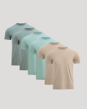 Six men's basic crew neck t-shirts in muted earth tones, neatly arranged in a row, showcasing the Classic Crews 6-Pack.