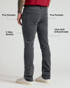 Man wearing Gray Wash Straight Comfort Stretch Jeans highlighting features like 5 pockets.
