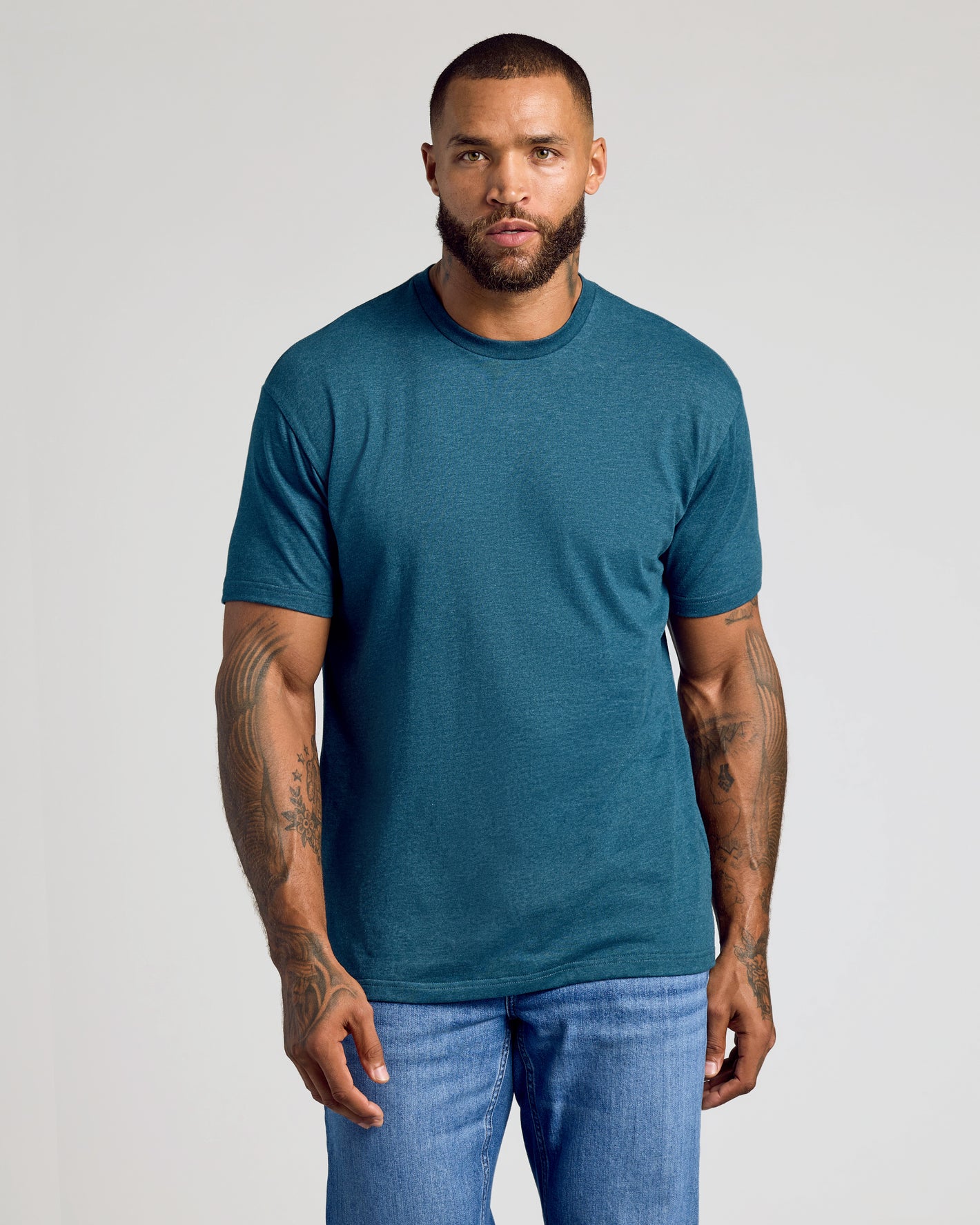 Man wearing CombinedListingTest Classic Crew Neck T-shirt and jeans.