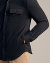 Black Fleece Shirt Jacket with chest flap pockets and buttoned cuffs.