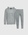 A two-piece gray fleece tracksuit set consisting of a zip-up hoodie with white drawstrings and matching jogger pants, displayed on a light gray background.
