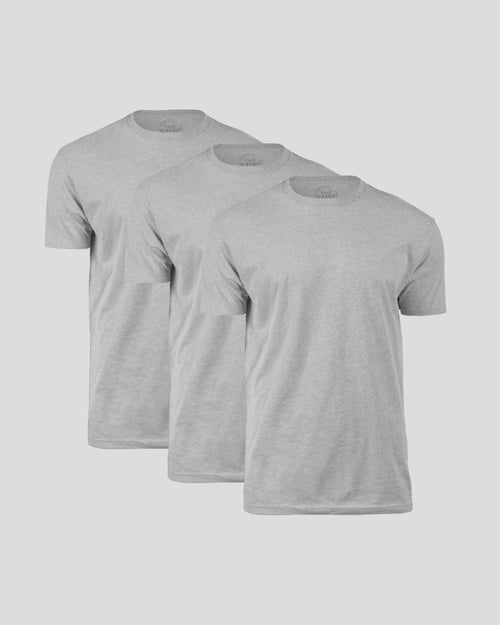 Three gray t-shirts stacked on a light gray background