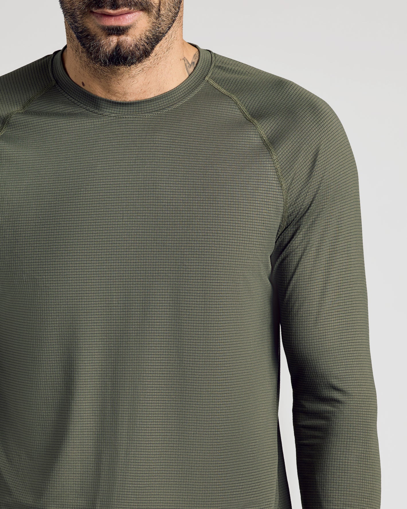 Kelp Long Sleeve Active Mesh Crew on man, showcasing texture and fit.