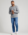 Man wearing Classic Long Sleeve 3-Pack in heather-gray with jeans and sneakers.