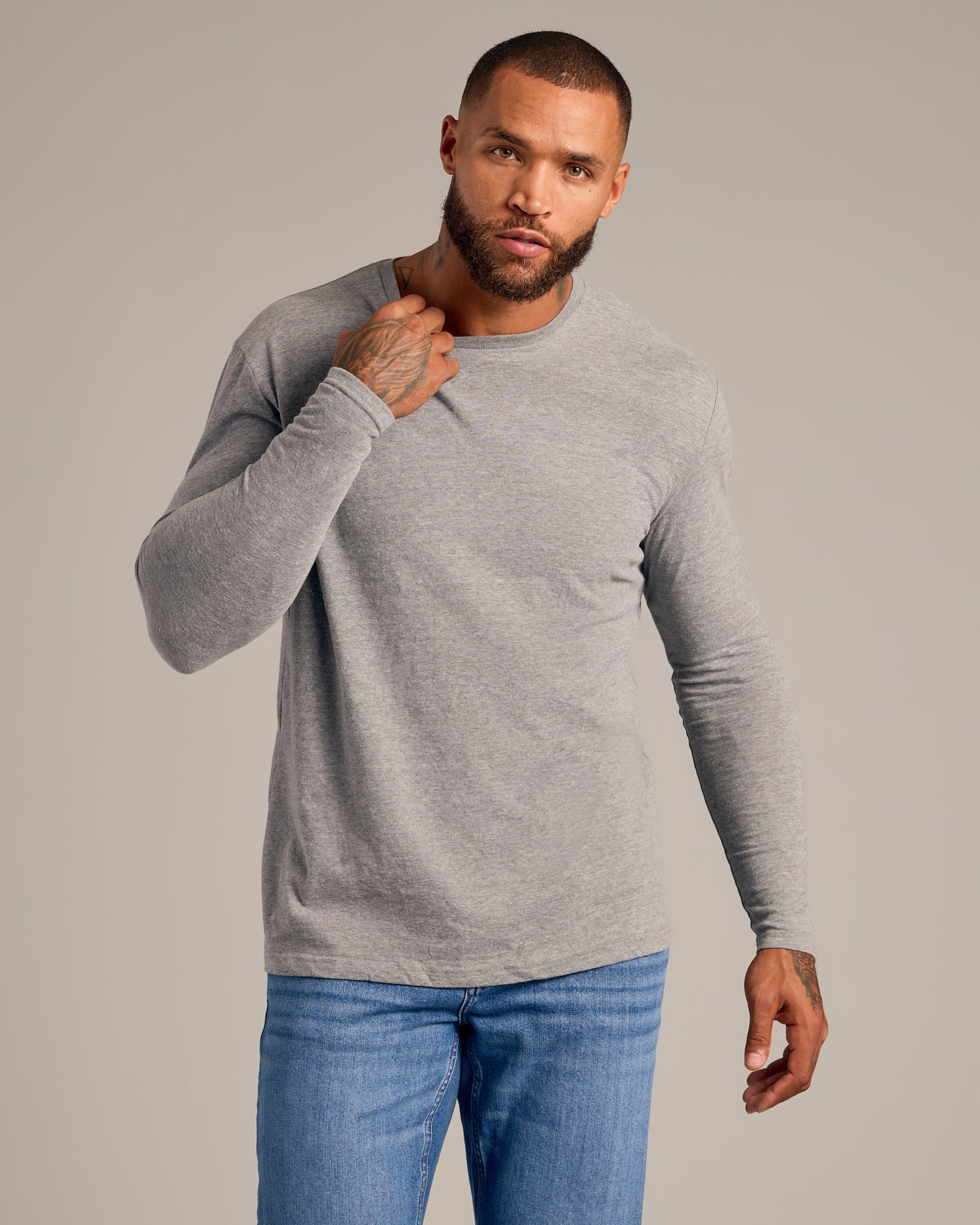 Earth Tones Variety 6-Pack: Man in gray crewneck and blue jeans.