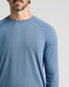Fiord Long Sleeve Active Mesh Crew on man, showcasing its textured design.