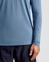 Person in Fiord Long Sleeve Active Mesh Crew with black pants.
