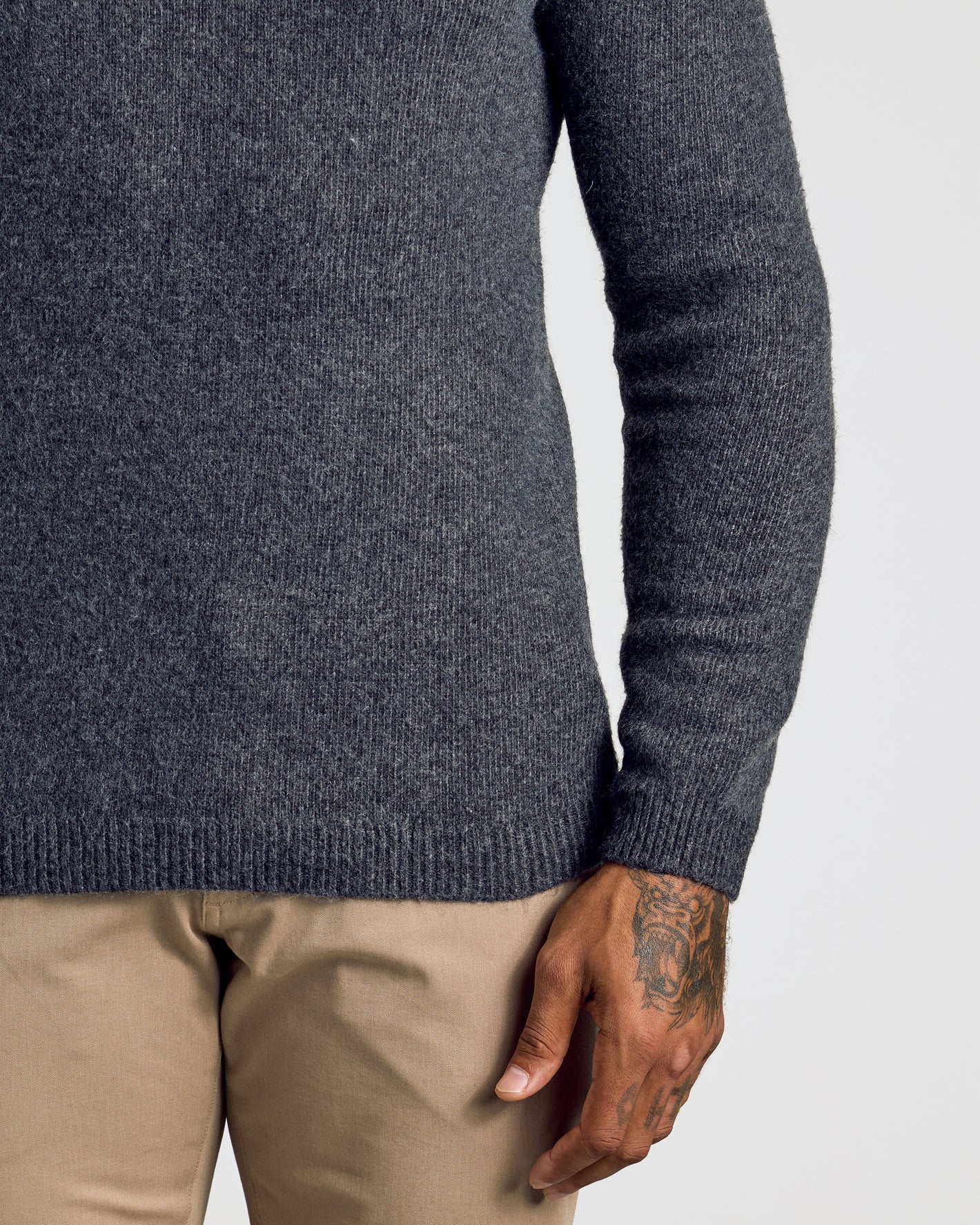 Charcoal Heather Gray Marled Crew Neck Sweater with ribbed hem and cuffs.