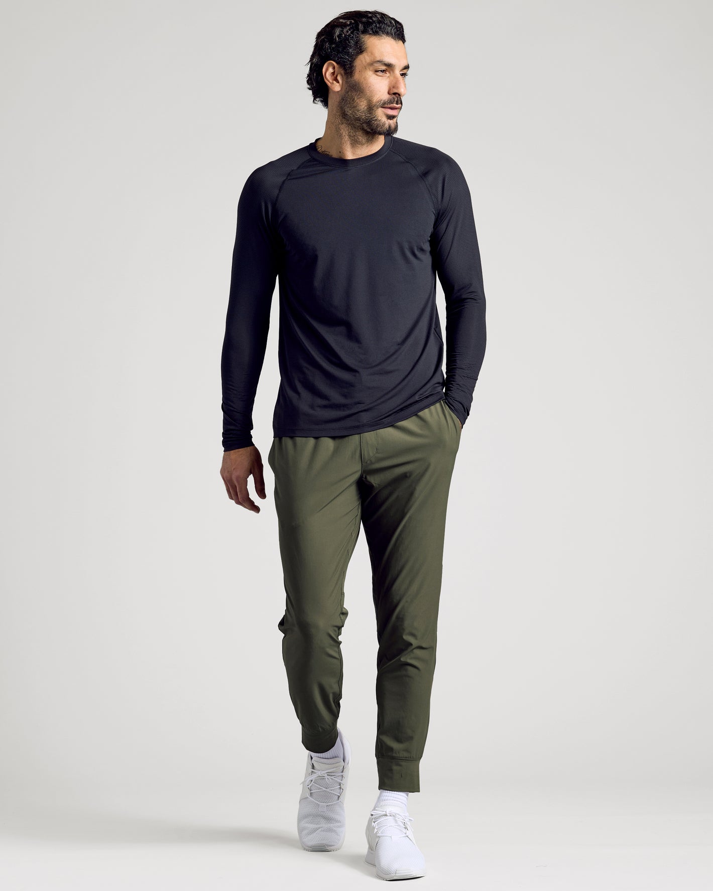 Man in Kelp Active Training Joggers, showcasing slim athletic fit.