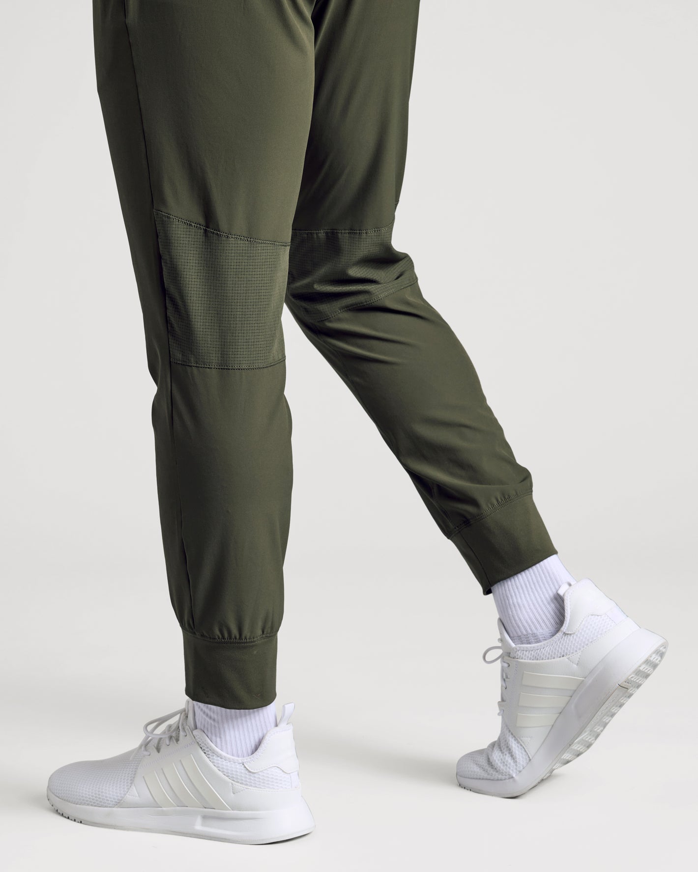 Kelp Active Training Joggers with white sneakers and crew socks.