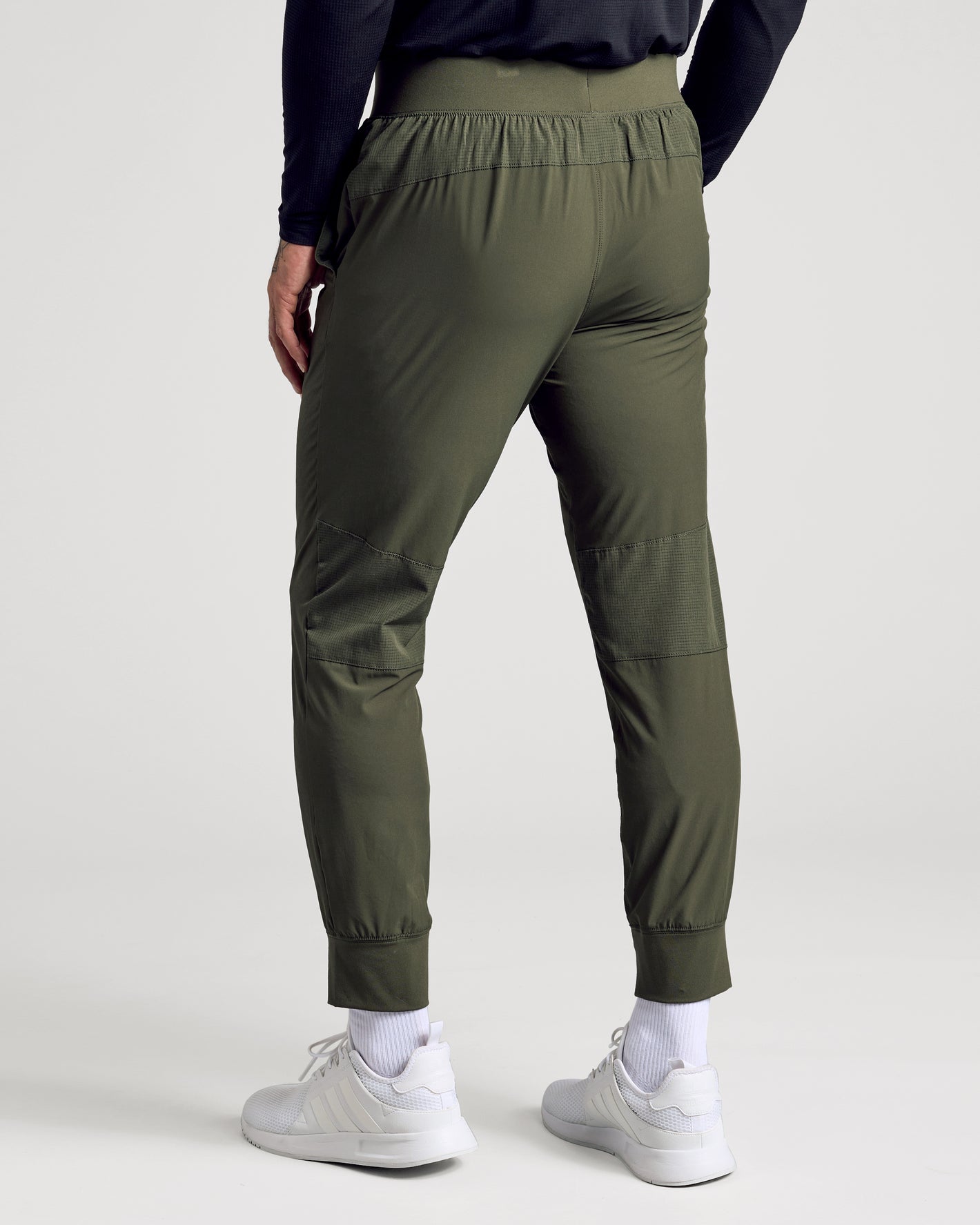 Kelp Active Training Joggers with ribbed knees, cuffed ankles, and sneakers.
