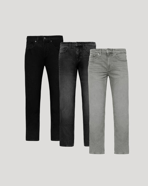 Three pairs of jeans in black, gray, and light gray on a light gray background