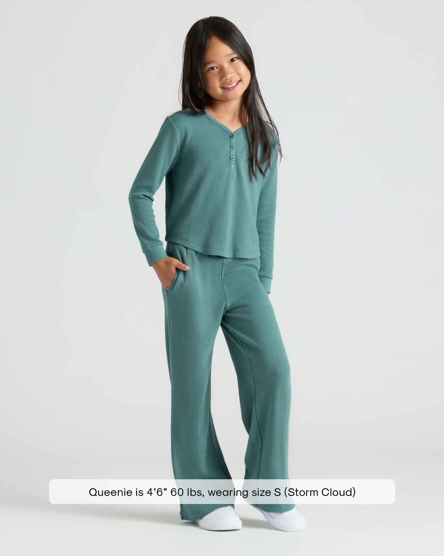 Girl models Girls Stormcloud Long Sleeve Boxy Waffle Henley with wide-leg pants.
