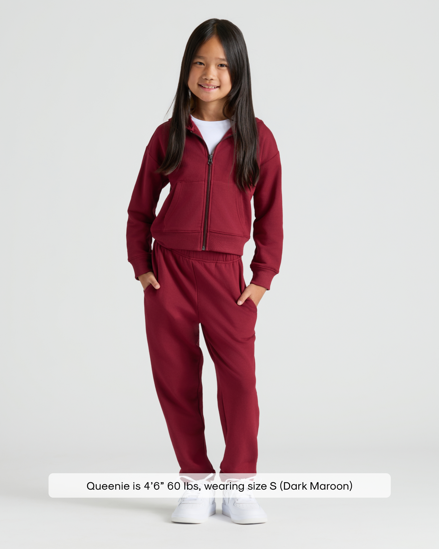 Young girl in Girls Dark Maroon Cropped Zip Hoodie & Relaxed Joggers.