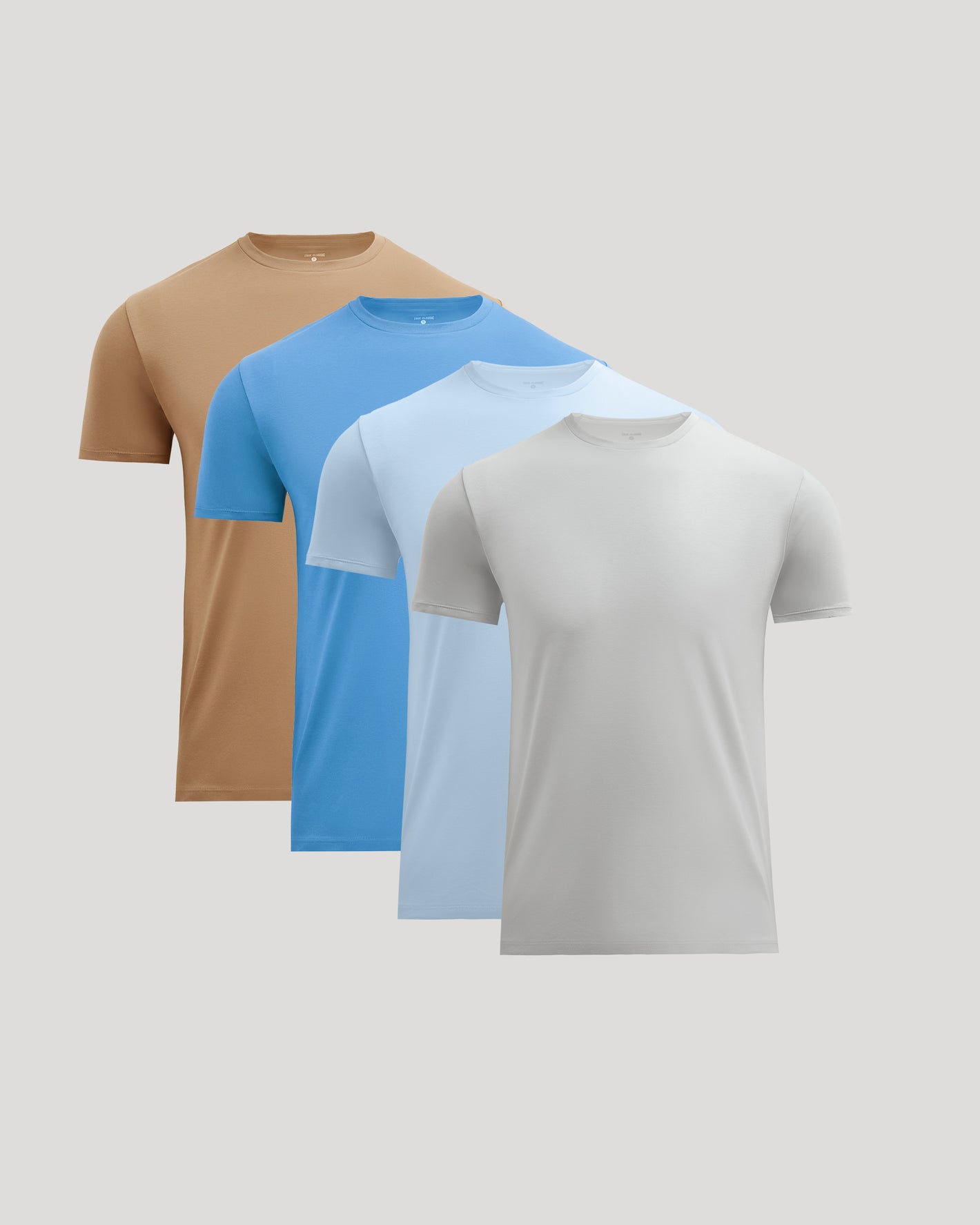 Seasonal Premium Pima Crews 4-Pack arranged in overlapping display.