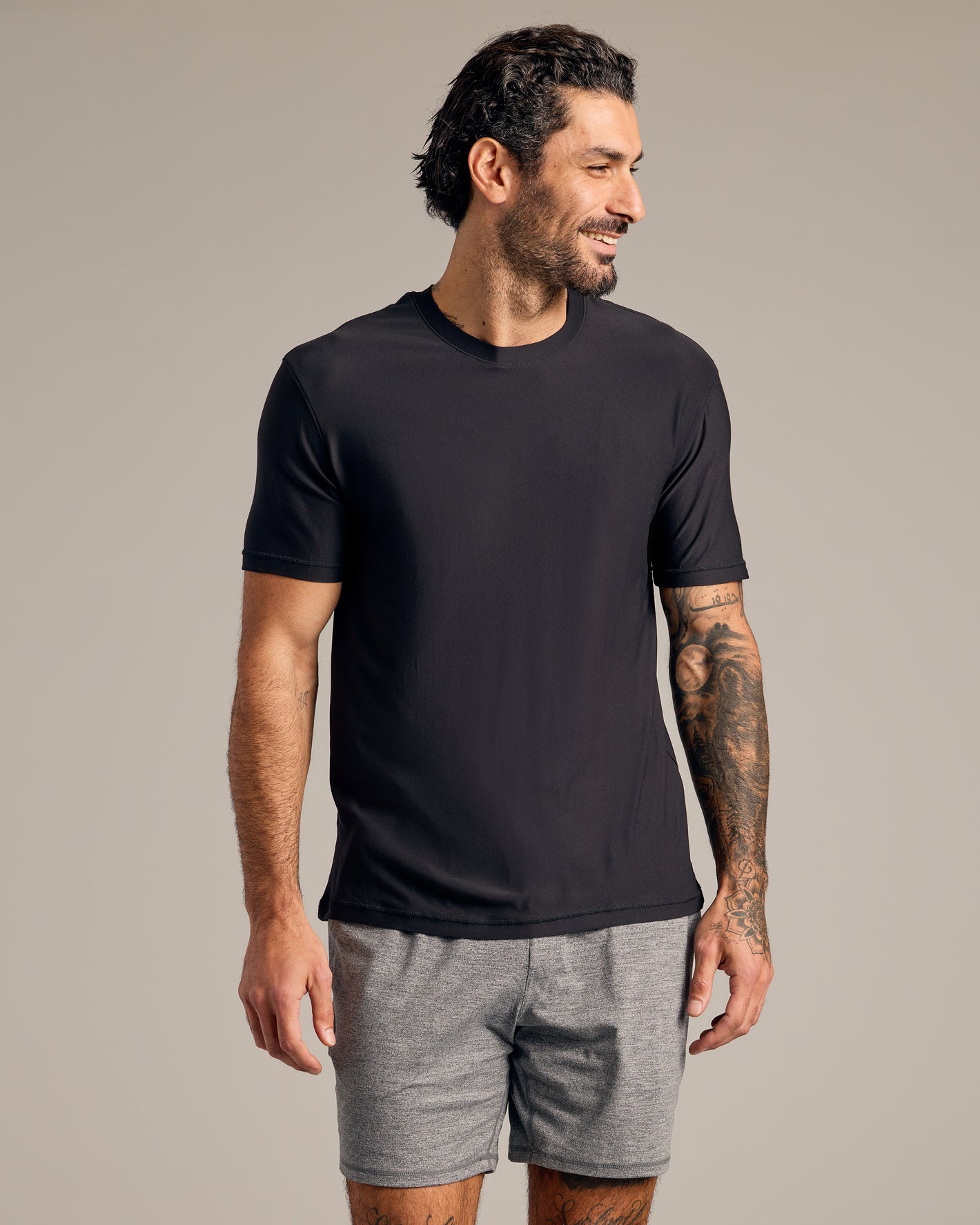 Man wearing Try 1 Of Everything 5-Pack T-shirt and shorts.