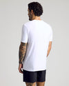 Staple Active Crew 3-Pack: Man in white T-shirt, black shorts, tattooed arm.
