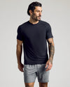 Man in Black & Navy Active Mesh Crew 3-Pack, showcasing breathable tee.