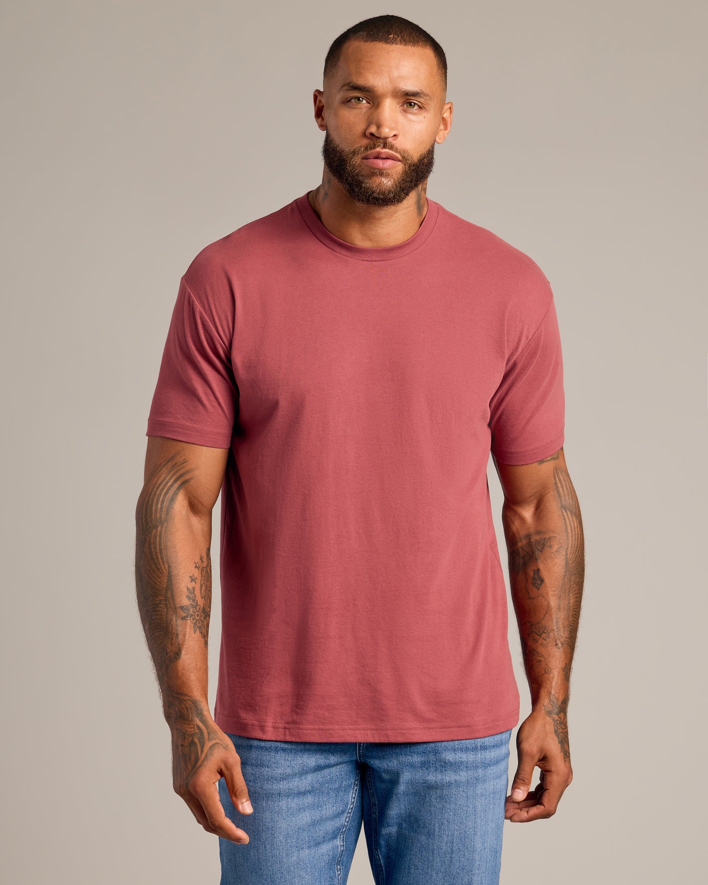Man wearing CombinedListingTest Classic Crew Neck T-shirt with tattoos.