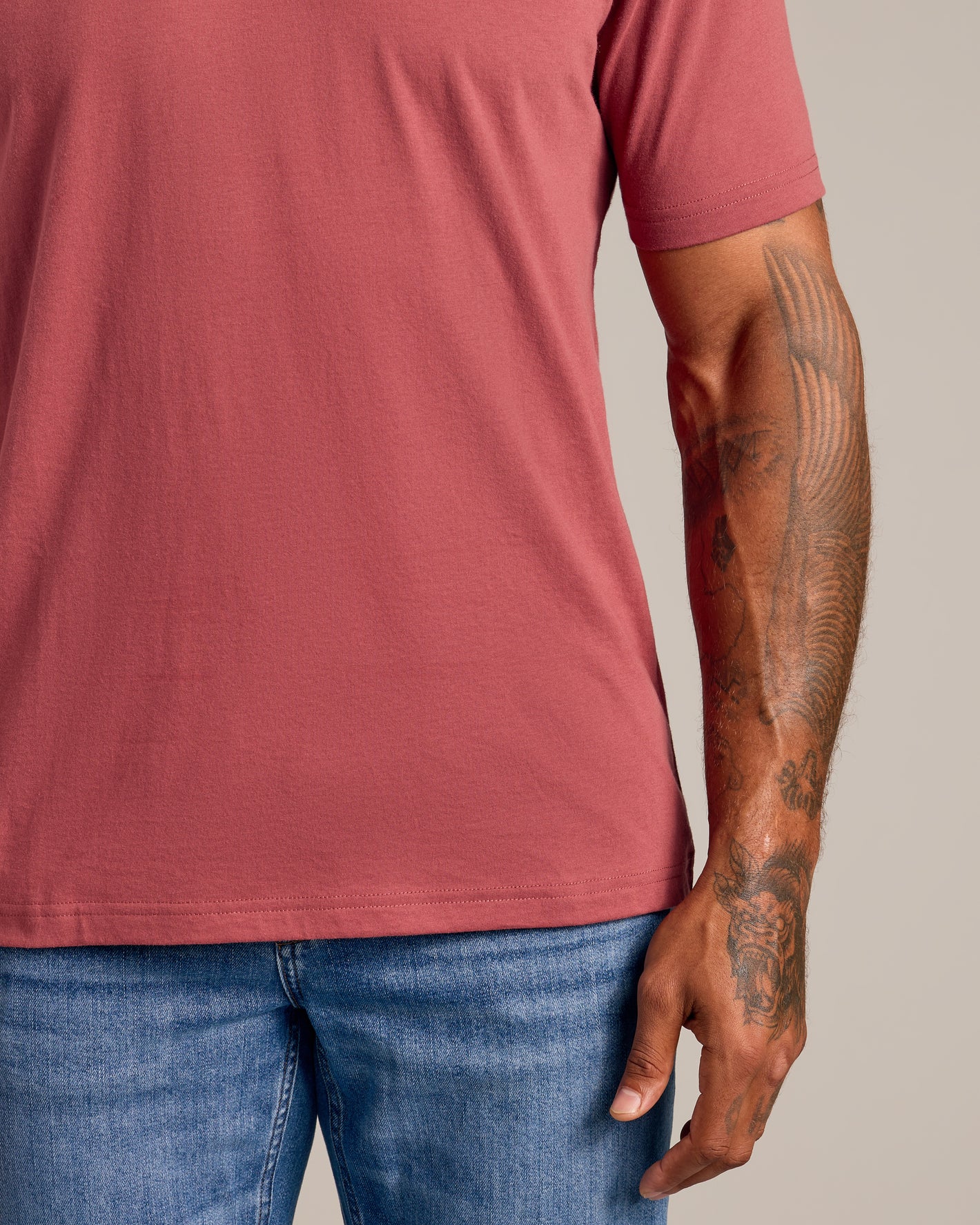 Rustic Apple Short Sleeve Crew Neck on tattooed arm.
