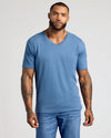 Fiord Classic V-Neck worn by tattooed man with beard.