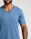 Fiord Classic V-Neck on bearded man, showcasing fit and tattooed forearm.